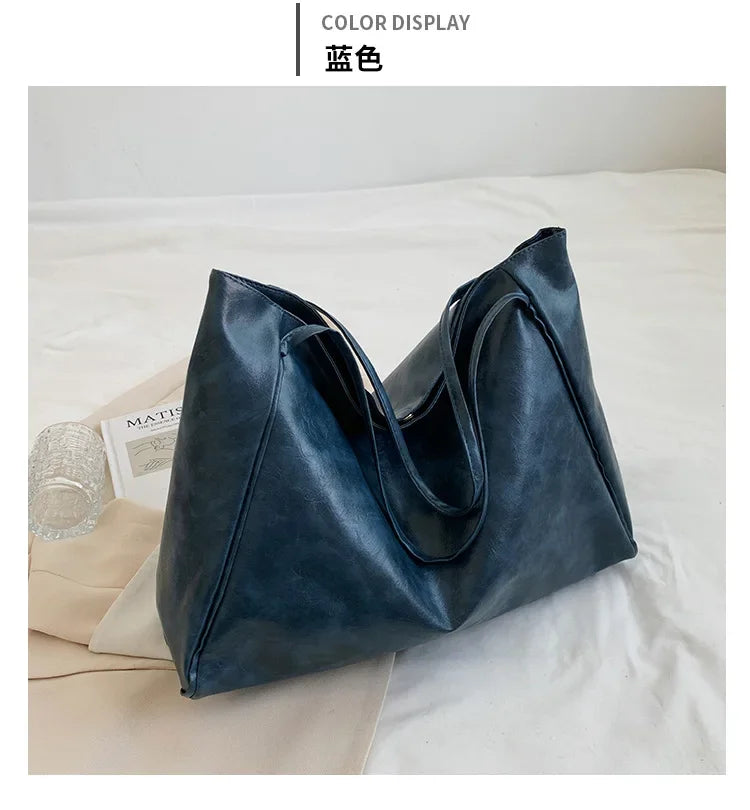 Women's shoulder bag – spacious, soft and elegant in a retro style