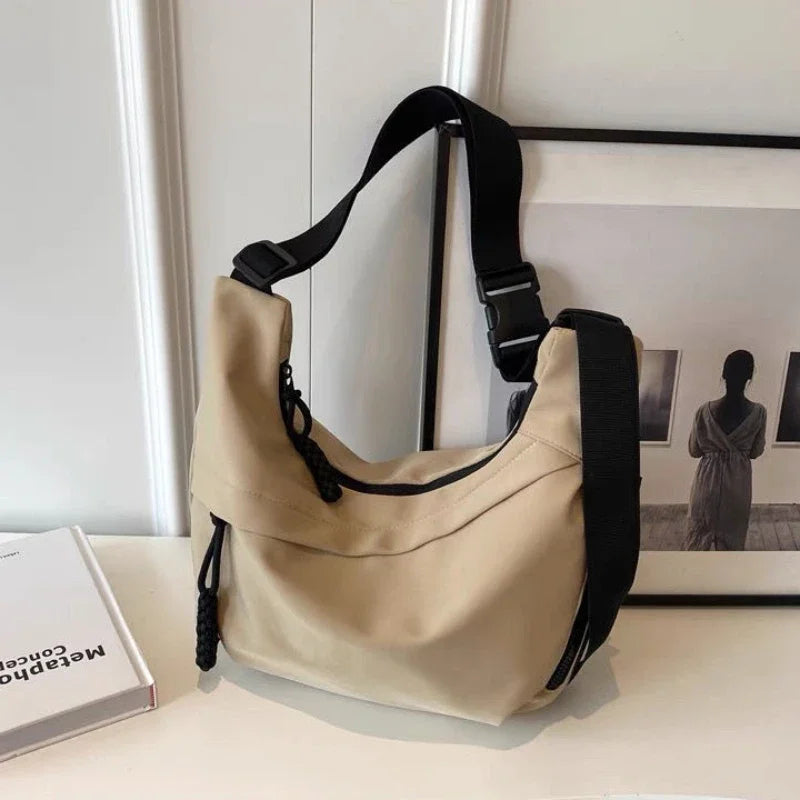 CarryAll - תיק צד אופנתי, קליל ובעל קיבולת גבוהה