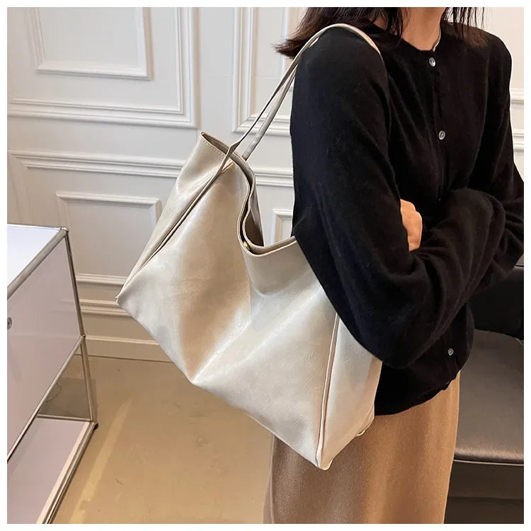 Women's shoulder bag – spacious, soft and elegant in a retro style