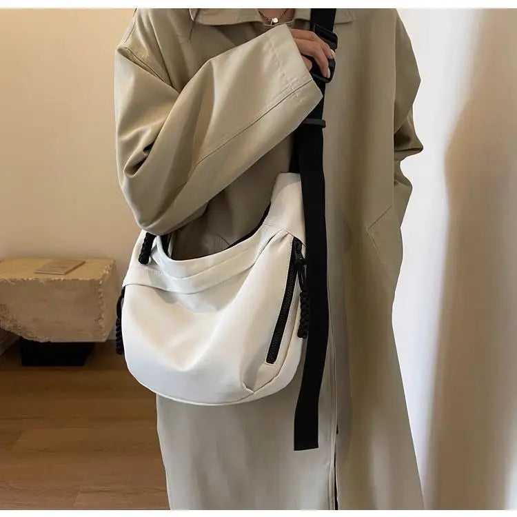 CarryAll - תיק צד אופנתי, קליל ובעל קיבולת גבוהה